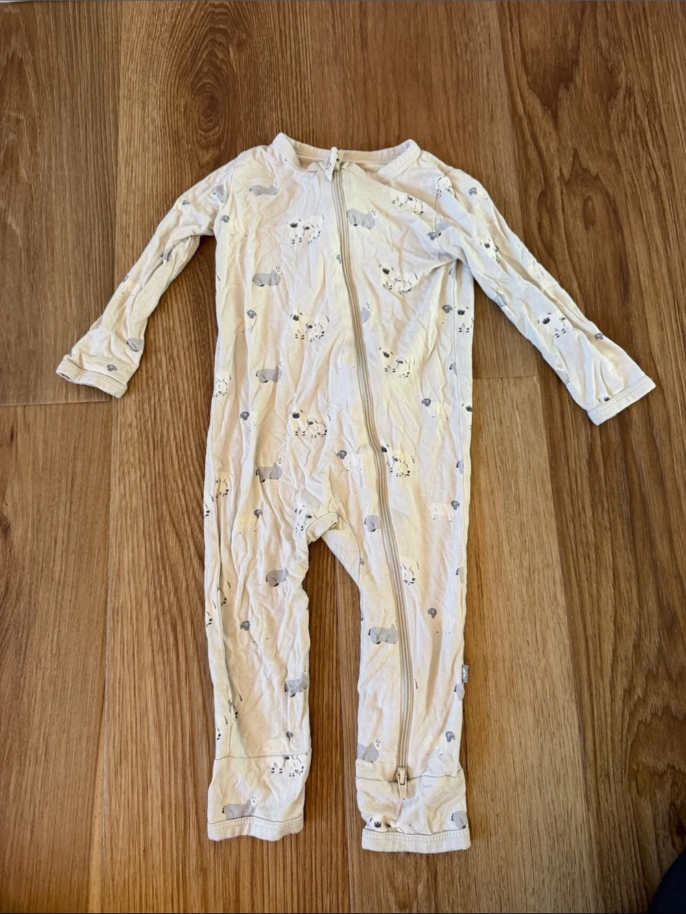 Kyte BABY Cream One-Piece Footless Zip Pajamas with Gray Animal Print
